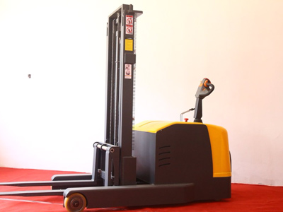 stand-on reach electric stacker
