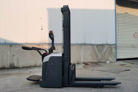 Electric stand-on stacker