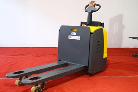 Stand-on pallet truck