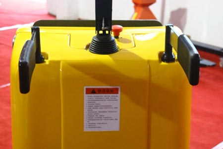 Pallet truck handrail