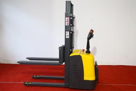 Stand-on double pallet stacker