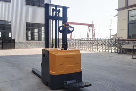 Low noise stand-on stacker