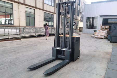Low noise warehouse stacker