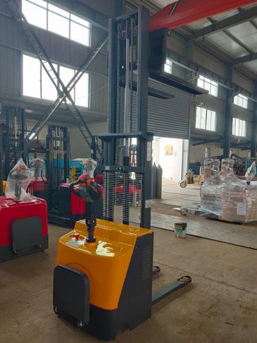 Stand-on fully electric stacker