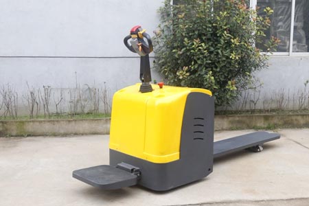 Stand‑on electric pallet jack