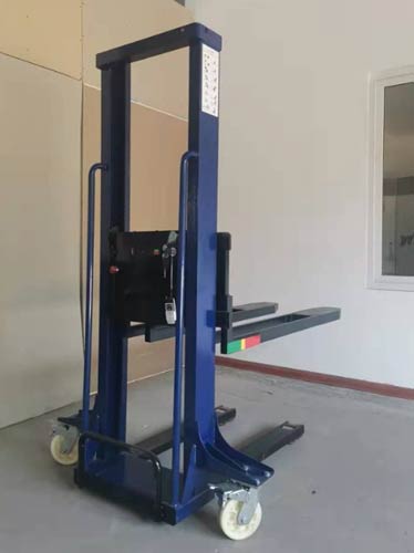 Electric self-loading stacker