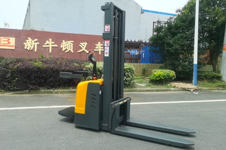 Stand-on stacker with double forks