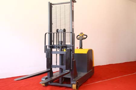 Stand-on counterbalanced stacker